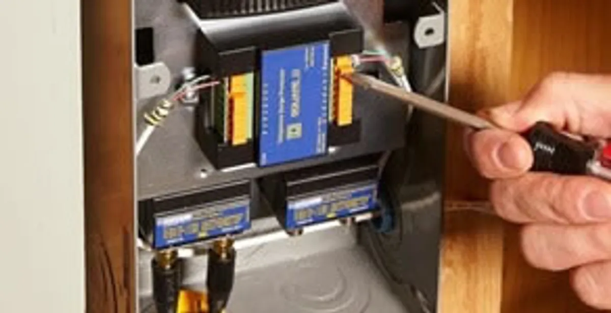 Whole home surge protection device being installed by a licensed electrician to protect electrical systems in Buffalo, NY
